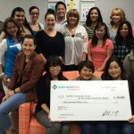 Check presentation to the Sacramento Covered team at their offices on Volunteer Lane in Sacramento.