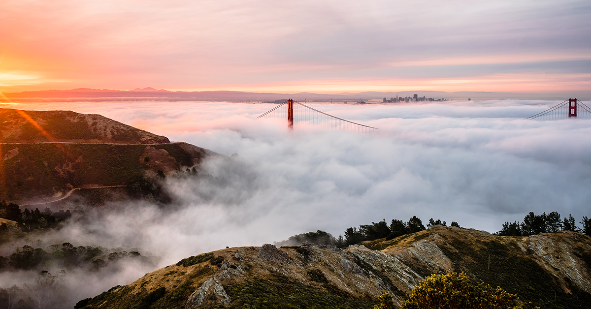 Fog Rolling Over the Golden Gate Bridge at Sunrise, San Francisco, California, America, USA